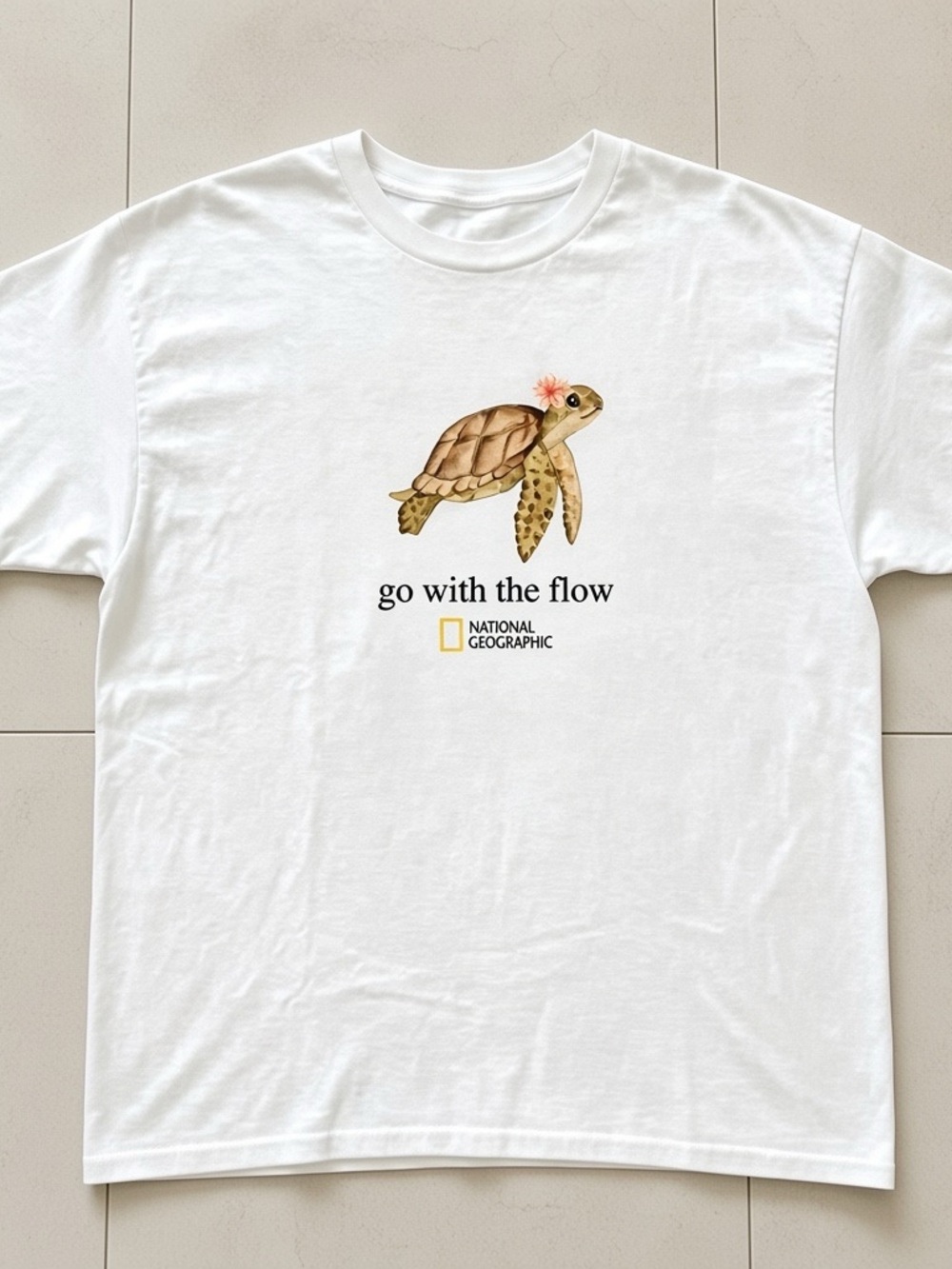 National Geographic “Go with the flow” White T-shirt